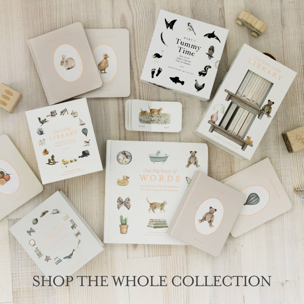 A flat lay of Our Little Library Vol. 3 (5 Board Books) and cards with animal and object illustrations on light wood, perfect for early language development. Text at the bottom reads, "SHOP THE WHOLE COLLECTION.