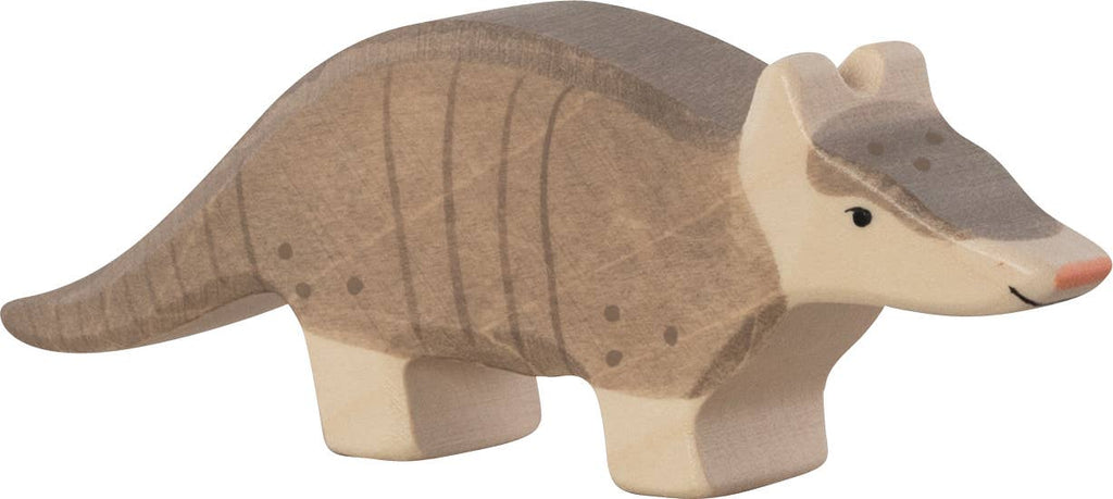 The Holztiger Armadillo is a handcrafted wooden toy, painted in brown and gray with simple features and a friendly look—part of the delightful HOLZTIGER figures collection.
