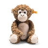 The Bodo Monkey Plush Stuffed Toy, 12 Inches, has a light beige face, belly, hands, and feet, large round eyes, a yellow tag in its left ear, and sits upright against a white background.