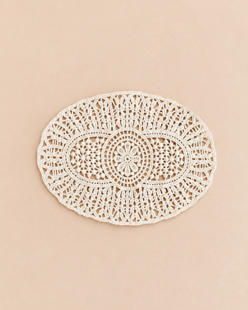 Oval cream-colored crochet doily with an intricate floral and geometric pattern, designed as an accessory for the Maileg Christmas Room Set.