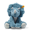 The Steiff Dixi Triceratops Dinosaur Plush Toy, 11 Inches, is a blue plush with soft textured fur, white feet and three white horns. It sits upright with a yellow ear tag against a white background.