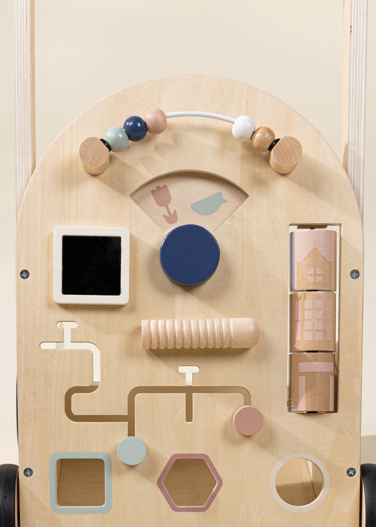 The Wooden Activity Walker is an engaging baby walker featuring beads on a wire, shape sliders, a spinning knob, pastel-colored blocks, and geometric cutouts. Its design encourages sensory exploration and motor skill development for young children, making it a delightful addition to their collection of sensory toys.