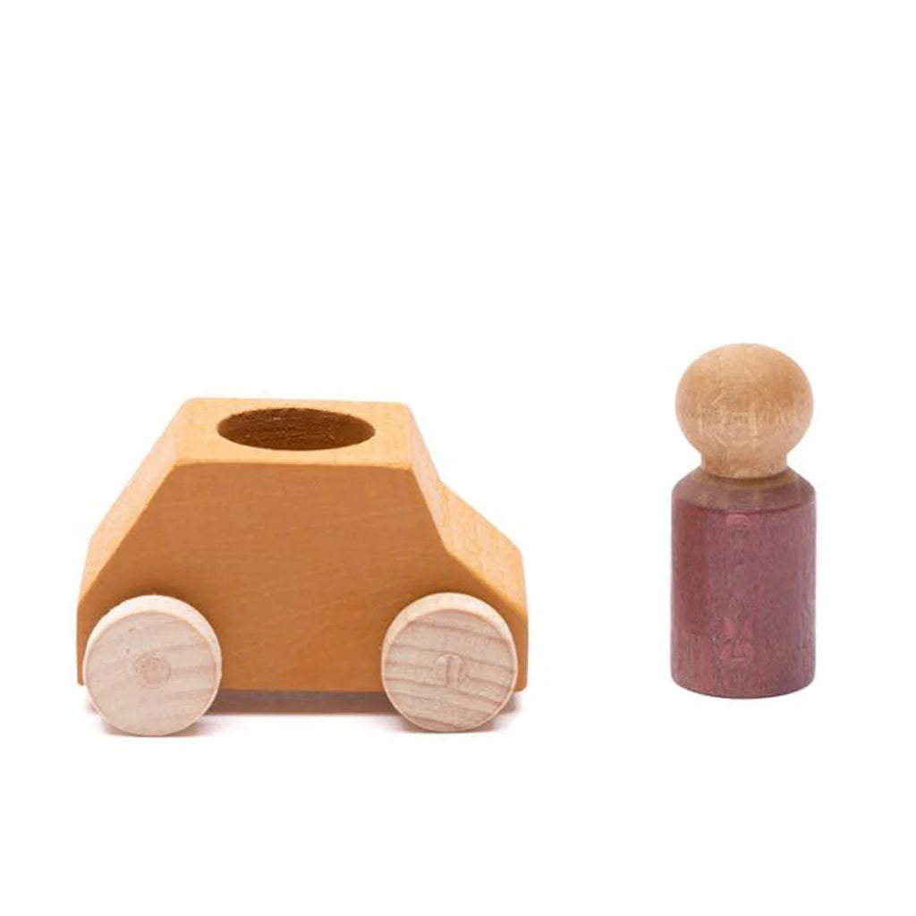 The Lubulona Wooden Car with Figure - Ochre is a small, eco-friendly toy featuring natural wood wheels, an ochre-colored car body with a hole on top, and a peg doll with a purple body and an unpainted round head.