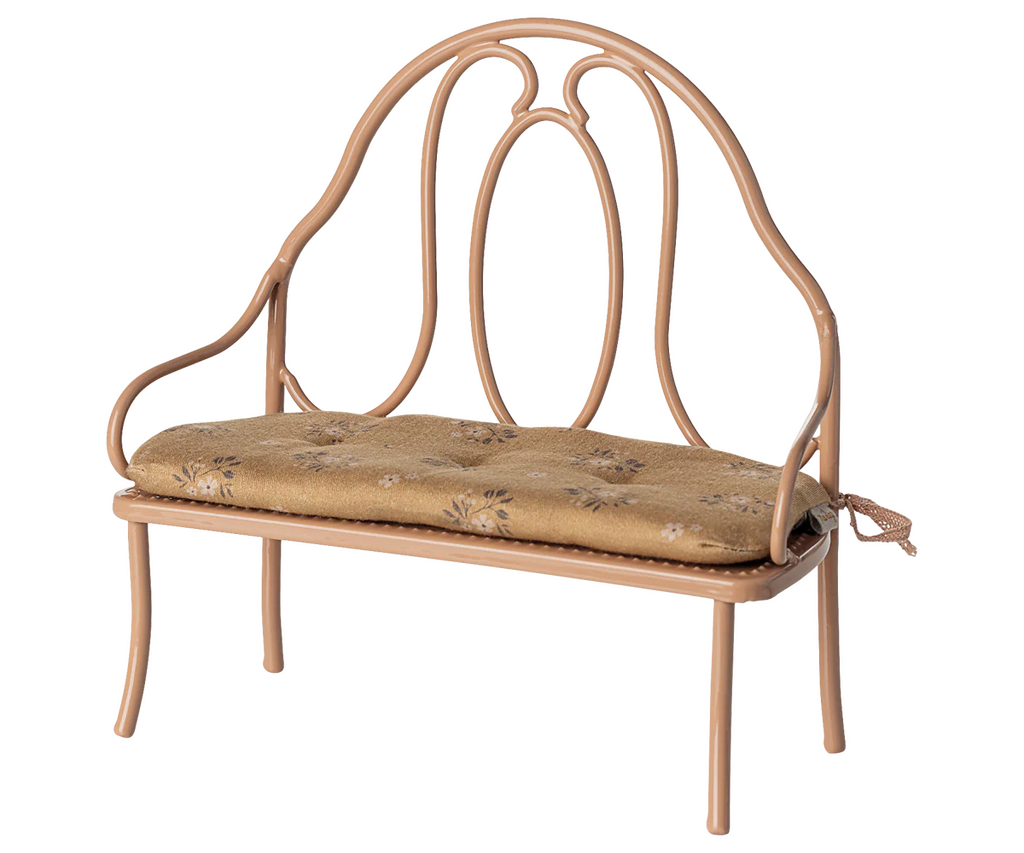 The PRE-ORDER: Vintage Bench, Mini - Dark Powder features a decorative metal frame and tan floral cushion, ideal as a comfy seat for bunny or rabbit-sized pets. Estimated ship date: Early October.