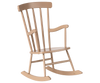 The PRE-ORDER: Rocking Chair, Miniature - Dark Sand (ships early August) features a light brown finish, vertical slats, curved armrests, and rockers—ideal as charming rabbit furniture or a cozy bunny chair for your nursery.