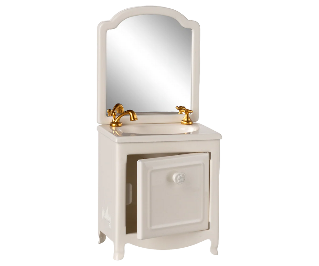 The PRE-ORDER Sink Dresser, Mouse - Off White (ships early September) features a gold faucet, gold handles, mirror, and an opening cabinet—an ideal bathroom addition for the Maileg Mouse hole Farmhouse toilet.