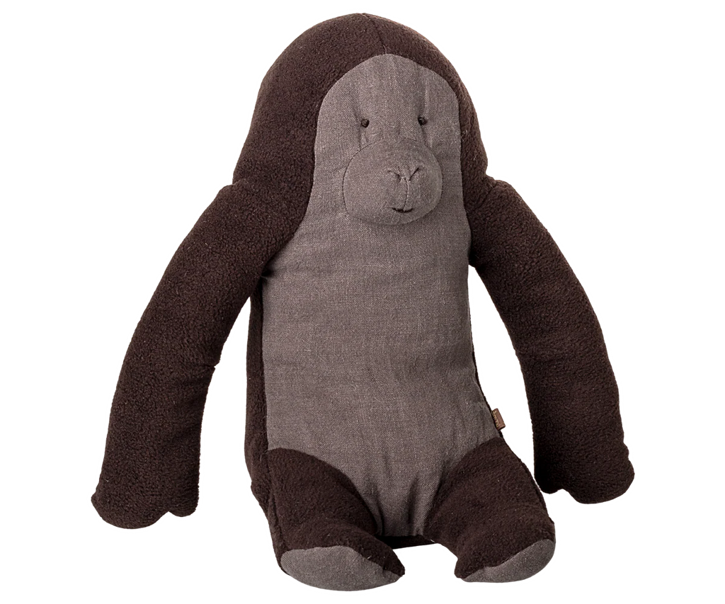 The Maileg Gorilla, Medium is a soft plush toy with dark brown arms, legs, and head, and a light brown face and body. It sits upright against a white background—ideal for cuddling or adding to your Safari friends collection.