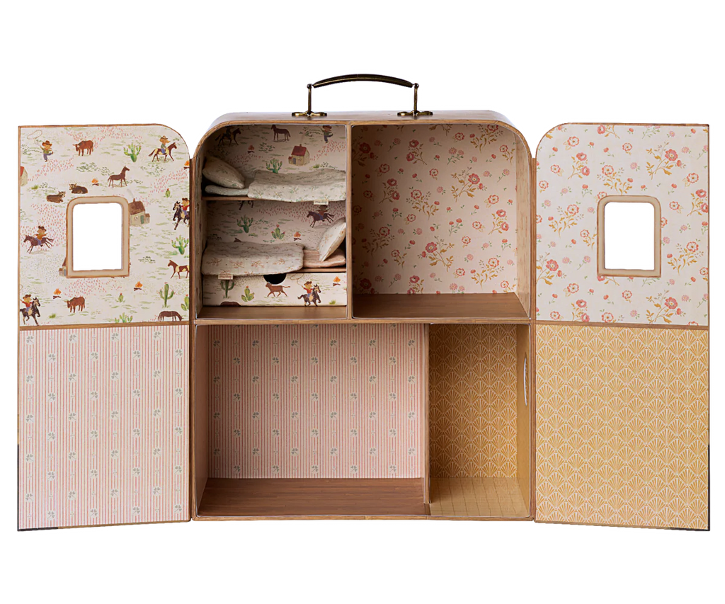The Maileg SuitCasa is a vintage-style toy wardrobe with open doors, pastel floral and animal wallpaper, mirrors, bedding included, and shelves in pink, yellow, and cream. Mice and furniture sold separately. Ships in one week.