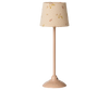 The Maileg Floor Lamp, Miniature - Powder, features a slender base and a floral fabric lampshade—perfect as a charming dollhouse lamp or Maileg accessory.