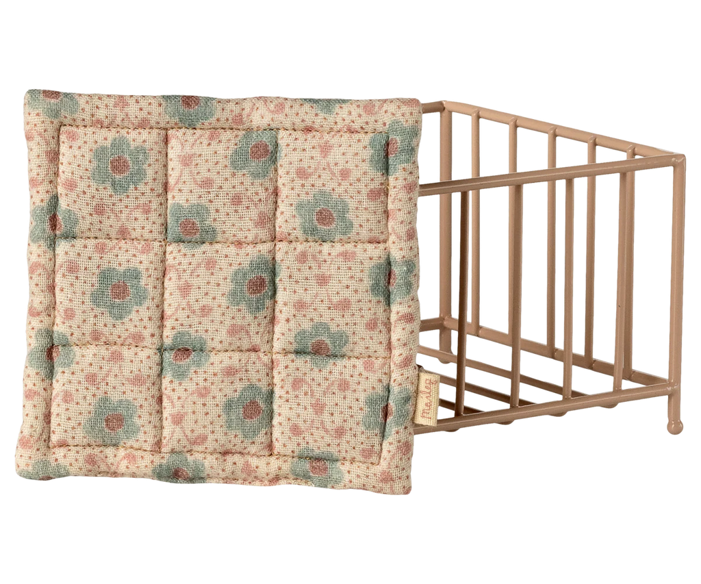 The Maileg Playpen, My - Rose features a padded, floral-patterned fabric square and a simple metal wire frame, pictured against a white background.