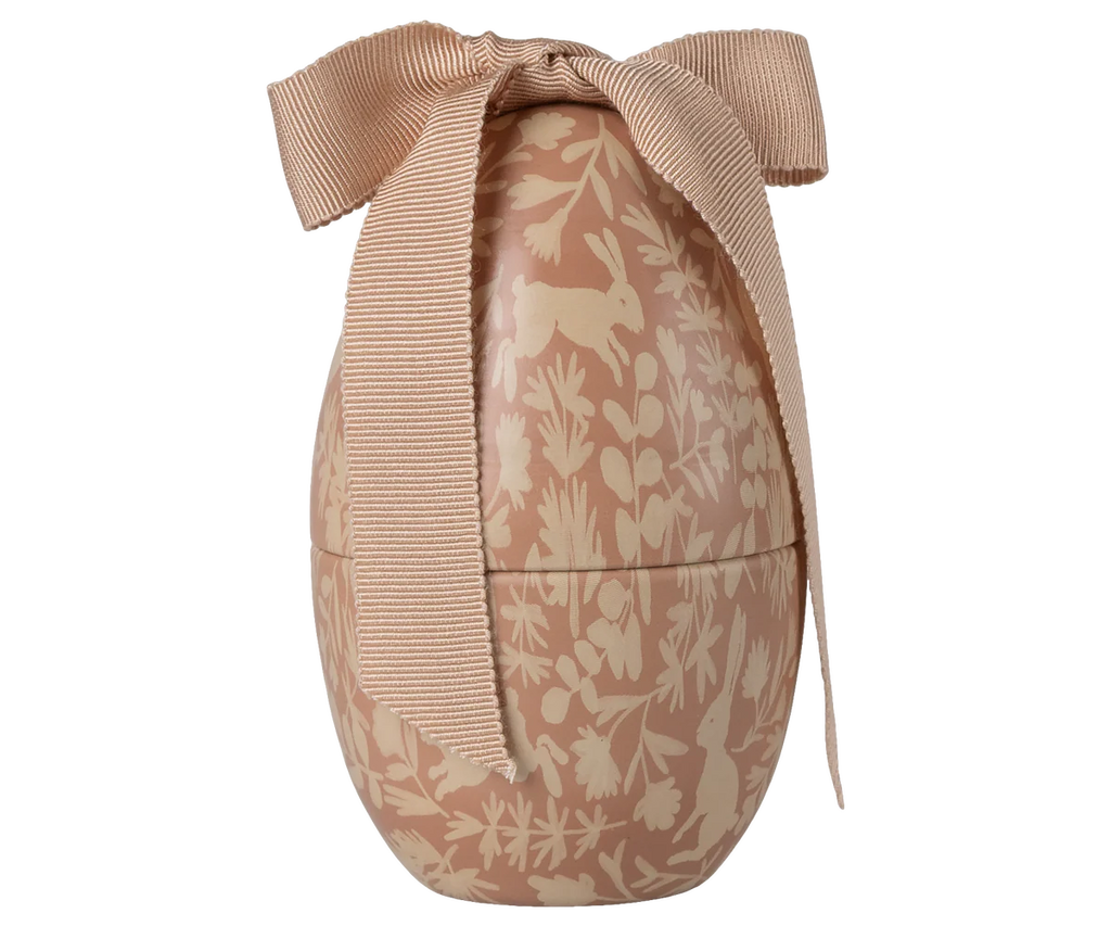 The Maileg Easter Egg, Small - Powder features a beige floral and bunny pattern with a textured bow—perfect for adding charm to your seasonal décor.
