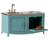The Maileg Kitchen, Mouse - Blue features a compact metal set with a sink, stove burners, oven with an open door, and a loaf of bread inside—ideal for mouse family play. Expected arrival: 04/01/26.