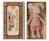 The Maileg Big Sister Mouse in pink pajamas rests in a matchbox toy bed with soft fabric bedding, featuring vintage-style “MOUSE RACE” and “GRAND OLD MATCH FACTORY” art. Expected arrival: 03/01/26.
