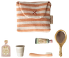 The Maileg Toothbrush Set in Bag, Mouse - Coral Stripe (expected 04/15/26) includes a striped toiletry bag, tiny perfume bottle, white cup, tan hairbrush, "Flora Forte" tube, and gold hand mirror for fun bedtime routine play.