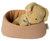 The Maileg Pet Basket - Powder (expected 03/01/26) features a pinkish-brown exterior and orange striped interior, providing a cozy spot for Maileg puppies or any tiny friend seeking comfort.