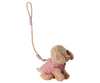 The Maileg Pet Supply, Harness and Leash - Rose features a cute, soft puppy plush in a pink quilted jacket attached to a patterned wrist strap—perfect for fans of adorable dog accessories. Expected arrival: 03/01/26.