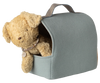 The Maileg Pet Carrier - Dusty Blue (expected 02/15/26) features a plush teddy bear with a collar, nestled inside a light blue carrier with a handle—perfect for displaying your favorite pet accessories.