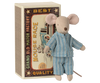 Maileg Big Brother, Mouse In Matchbox features a soft fabric mouse dressed in blue striped pajamas, standing in front of a large decorative matchbox labeled “Grand Old Match Factory Best Quality Mouse Race.” Reminiscent of the classic Maileg design, this charming toy exudes vintage whimsy and delightful detail.