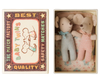 The “PMaileg Twins, Baby Mice in Matchbox - Checker” set features two sweet baby mice nestled inside a patterned matchbox bed, one dressed in blue and the other in pink. The charming box is adorned with checker designs and vintage-style illustrations, creating a delightful miniature scene.