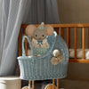 A handmade wooden lamp featuring Felix the Mouse in a blue outfit and party hat adds charming, softly lit decor to any nursery, perfectly complementing cribs and light curtains.