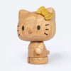 The Boyhood Hello Kitty 50th Anniversary Limited Edition features Hello Kitty with a gold bow on her left ear, black eyes, nose, and whiskers, standing against a plain light background.