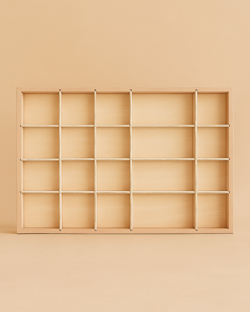 The Grapat Tinker Tray is a roomy wooden shelving unit with 20 rectangular compartments, separated by thin metal rods, perfect for organizing sustainable toys or serving as a spacious sorting tray. Set against a light beige background.