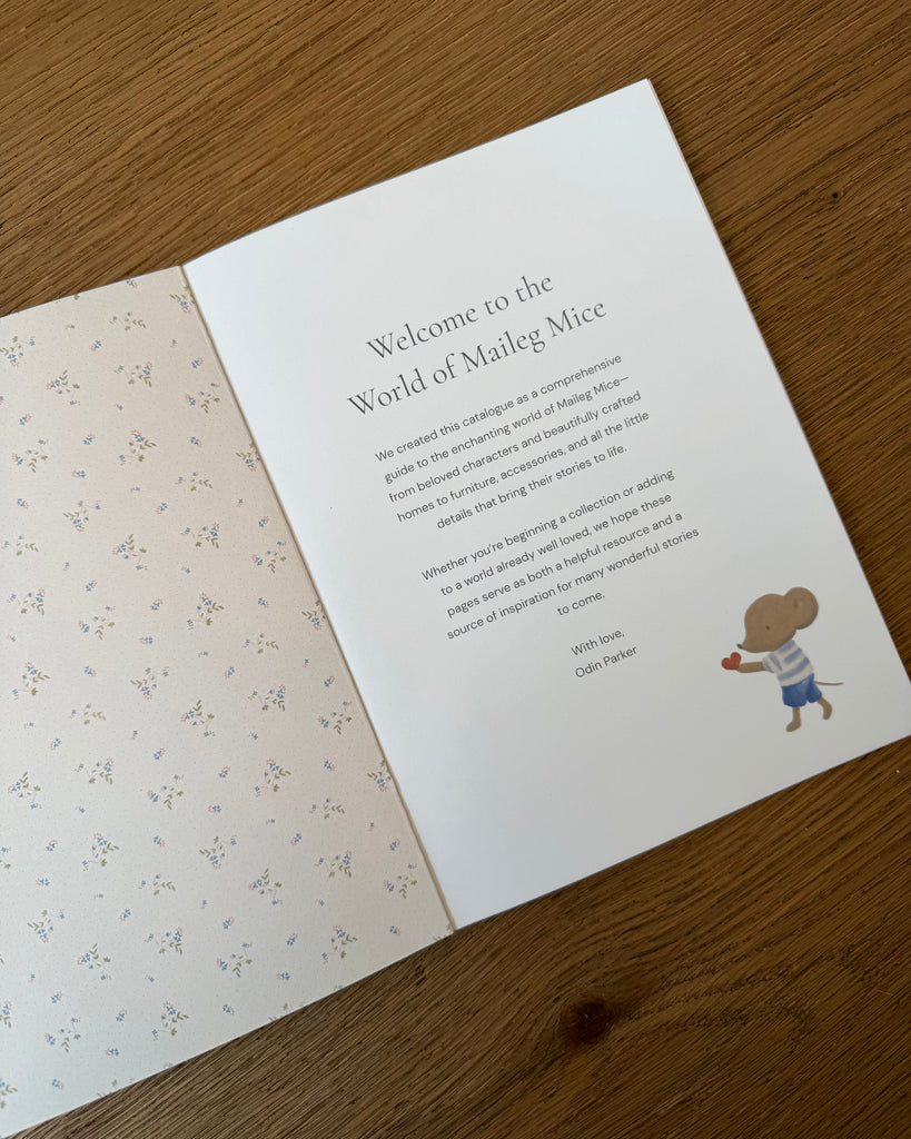 Odin Parker’s Maileg Catalog page titled “Welcome to the World of Maileg Mice,” featuring an illustration of a mouse holding a heart.