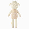 Cuddle + Kind Lucy the Lamb is a hypoallergenic stuffed animal in cream and beige with small pastel polka dots on its back, shown from behind. It features a textured head and floppy ears for extra charm.