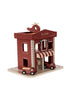 The Konges Sloejd - Wooden Fire Station is an enchanting structure made from FSC-certified wood, beautifully decorated in red and beige. It comes with two detachable fire trucks and boasts open windows, a striped canopy, and a "FIRE STATION" sign on top. A small helicopter is perched on the roof. While it's ideal for children, be mindful of possible choking hazards.