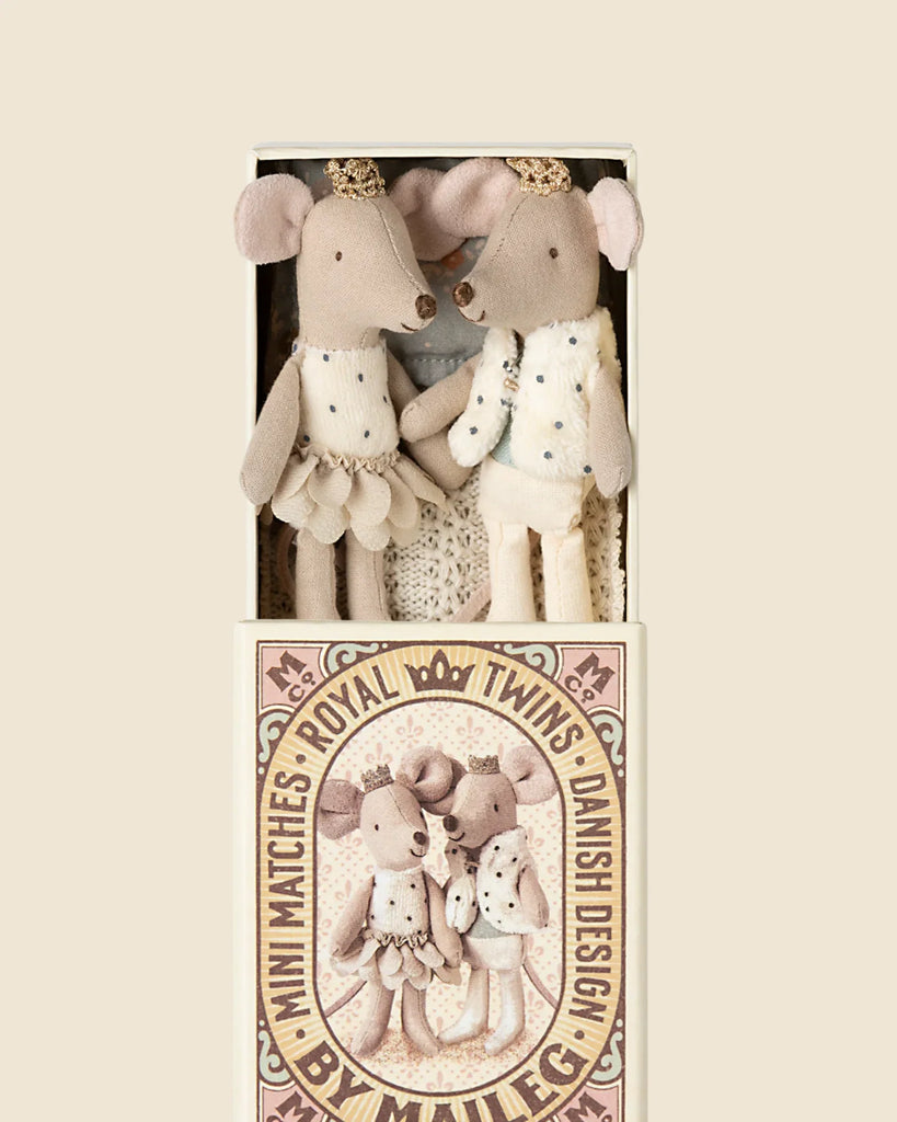 The Maileg Royal Pumpkin Carriage Set features two royal twin mice in white and gold with crowns, elegantly arranged in a decorative box—perfect matchbox mice for magical adventures.