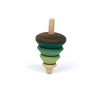The Mader Spinning Tree Top On Trunk is a maple wood top with tiered, bulbous sections in brown, green, and light yellow. It stands upright on a white background and meets toy safety standards.