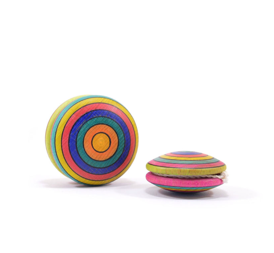 Two Mader Wooden Yoyo - Striped toys made from beech wood, featuring colorful concentric circles in blue, green, yellow, pink, orange, and purple, are shown on a white background. They meet the European safety standard EN71.
