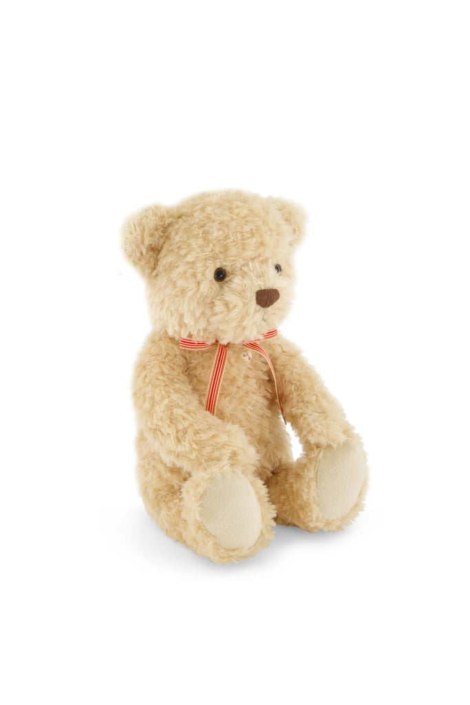 Snuggle Bunnies - Arthur the Bear features soft light brown plush, beige paws, and a red and white striped bow around the neck—making it a charming nursery companion. Product shown on a plain white background.