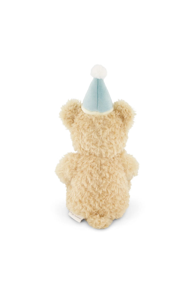Snuggle Bunnies - Birthday Arthur - Sky, a fuzzy beige plush bunny, is shown from the back wearing a light blue party hat with a white pom-pom, against a plain white background.