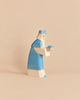 Ostheimer Blue King With Crown, a handcrafted wooden toy of a king in a blue crown and robe holding a small blue gift for imaginative play.