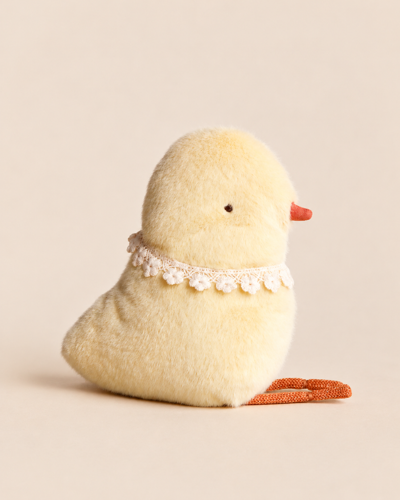 Maileg Chicken Plush, a small yellow chick with a soft hand feel wearing a white lace collar.