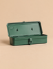 Antique green Toyo - Steel Toolbox T-320 with the lid open and a front latch.