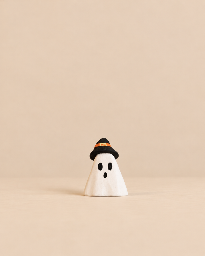 Bumbu Handmade Wooden Ghost Wizard figurine, a small wooden ghost wearing a black witch hat with an orange band, perfect as a Waldorf toy.