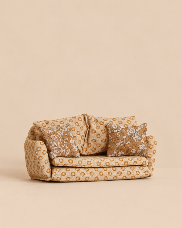 Maileg Sofa Bed, Mouse, Large - Ocher patterned with small ocher flowers, including two rectangular floral throw pillows.