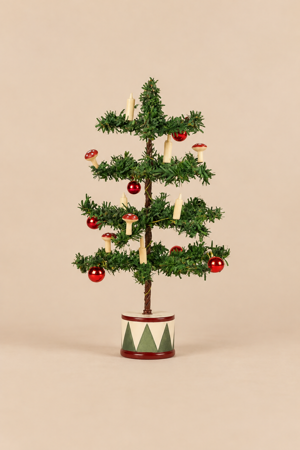 Maileg Christmas Tree, Mouse Size, featuring a decorated base, LED bulbs, small red ornaments, cream-colored candles, and mushroom-shaped decorations.