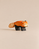 Hand-carved Handmade Holzwald Red Panda figurine with orange and black paint.