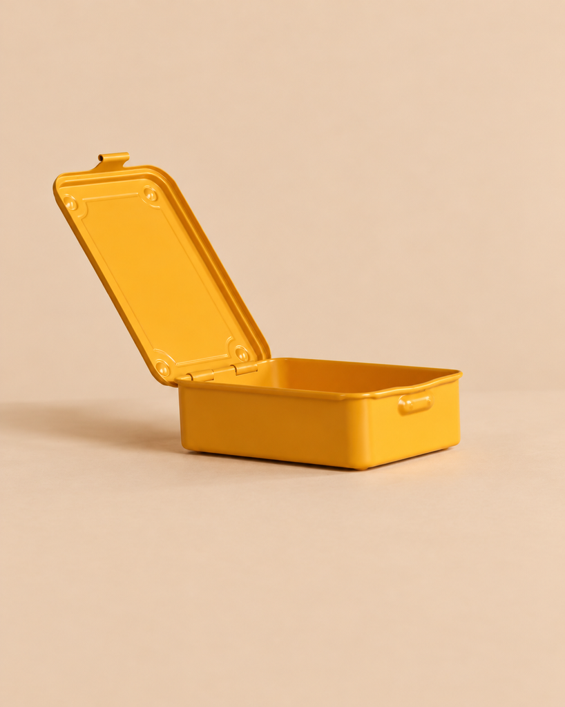 Mustard yellow, rectangular Toyo - Steel Stackable Storage Box T-150 with an open hinged lid, perfect for organizing art supplies.