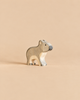 A Holztiger Koala, Standing handcrafted wooden toy koala shown in profile.