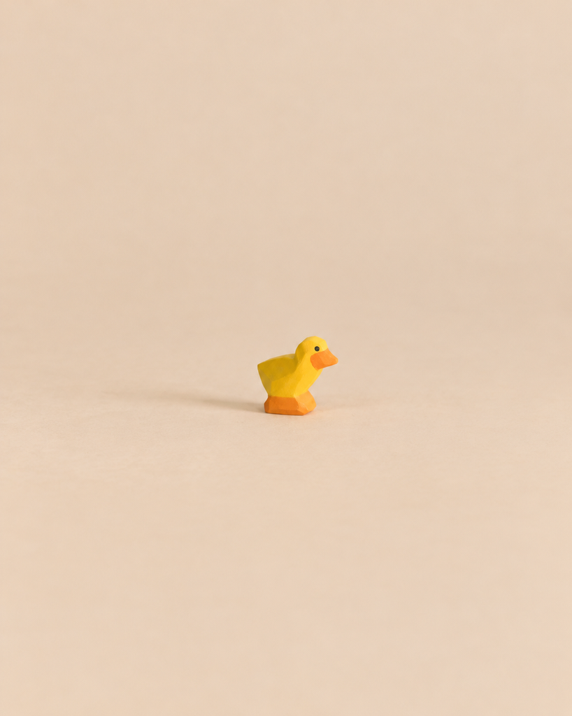 Handcrafted Ostheimer Chick, Yellow figurine in yellow and orange.