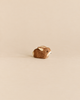 Handcrafted wooden Ostheimer Small Rabbit figurine in a sitting position.