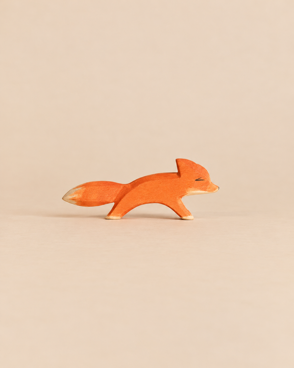 Hand-carved wooden Ostheimer Small Fox - Running in a pose, perfect for imaginative play.