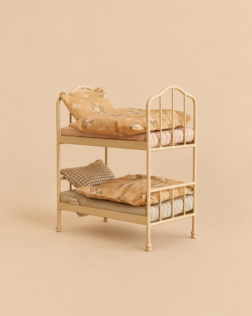 Maileg Bunk Bed featuring a metal frame with mattresses, pillows, and patterned bedding in a Mouse hole Farmhouse style.
