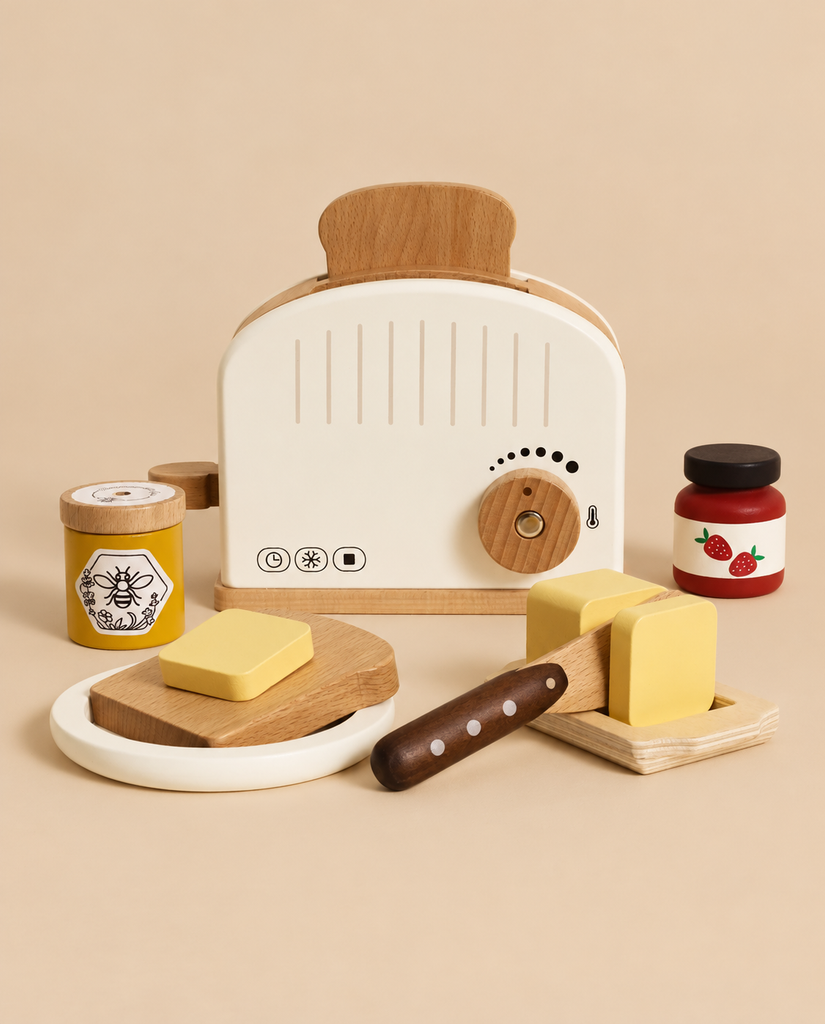 Pop-up Toaster & Breakfast Set featuring an FSC-certified wooden toaster, a slice of bread, butter pats, a butter knife, a jar of honey, and a jar of strawberry jam for pretend play.