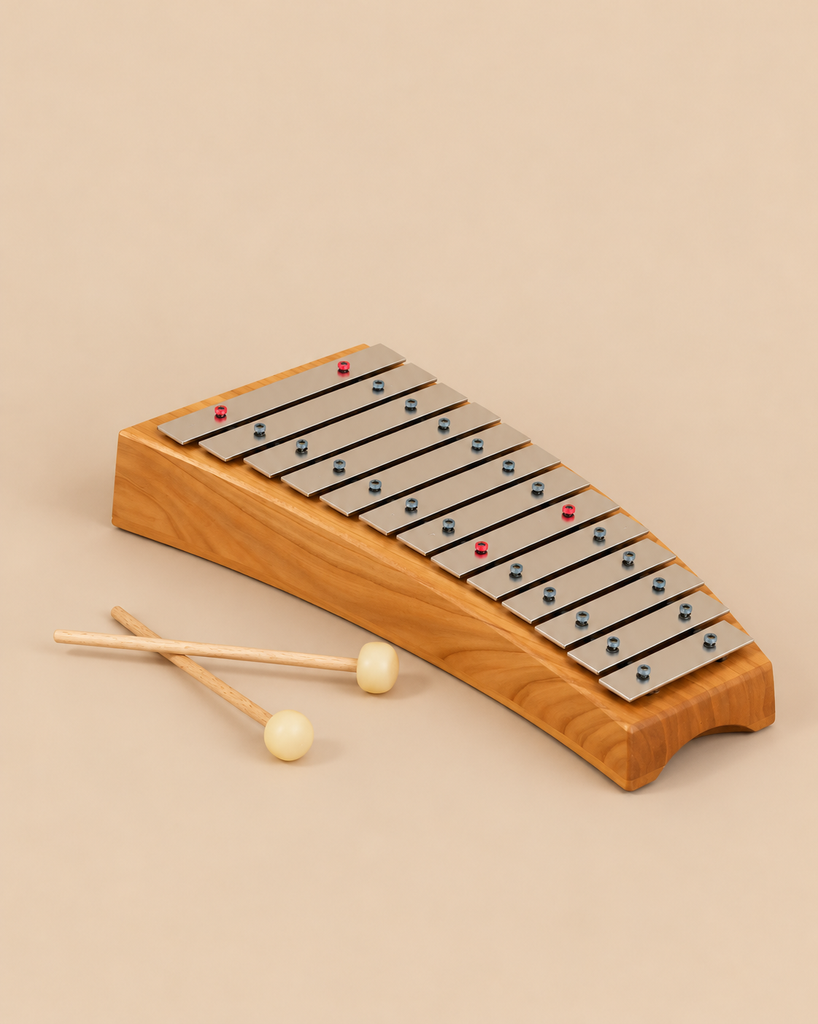 A Choroi Diaronne Diatonic Glockenspiel - 13 tones made of cherry wood with thirteen steel bars and two mallets.