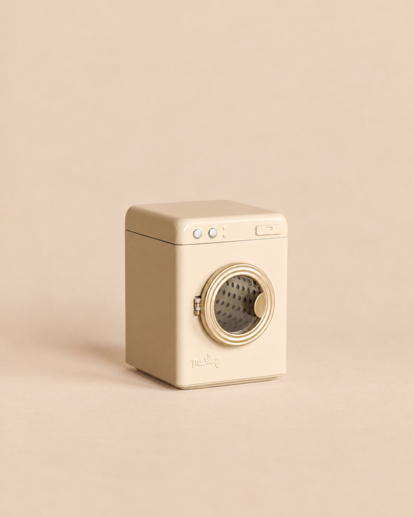 Maileg Washing Machine For Mice in a neutral tone, featuring a round front-loading door.